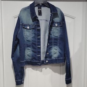 Almost Famous Women's Denim Jacket in a blue wash. 